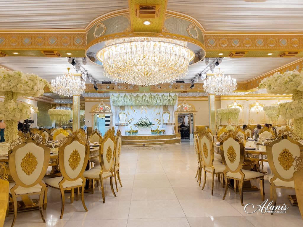 Golden Palace ballroom with crystal chandeliers and gold chairs