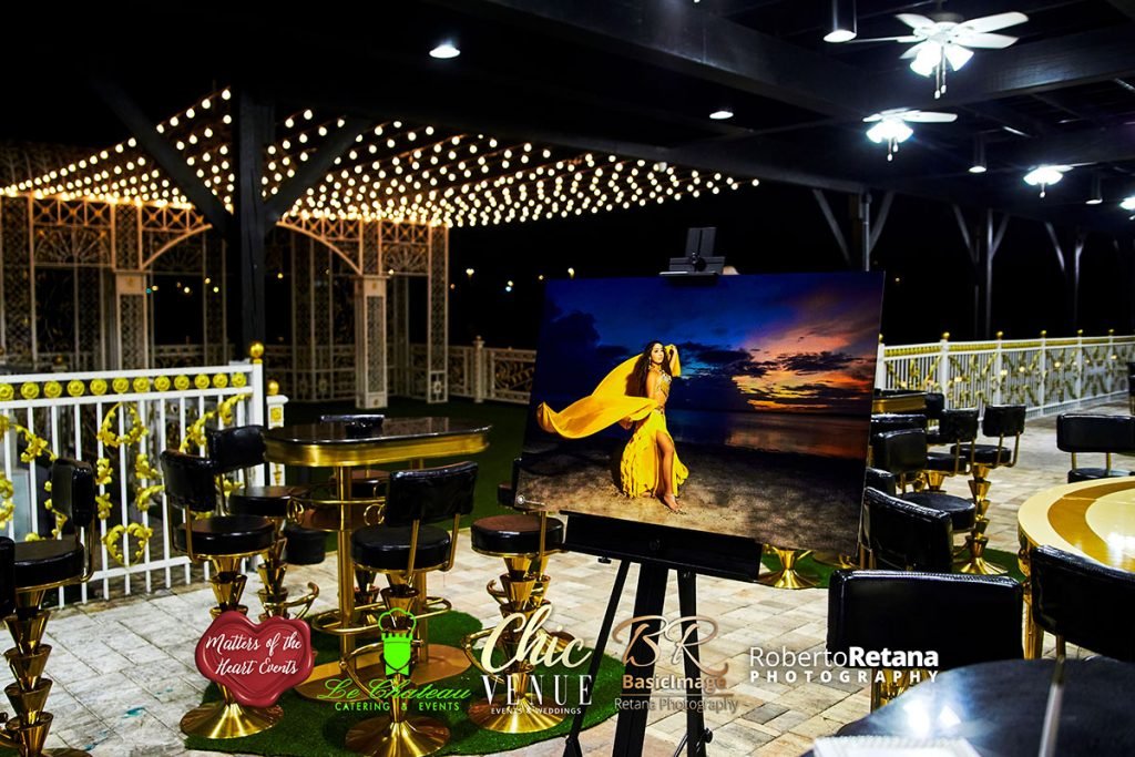 Ballroom stage set up with a screen for a presentation